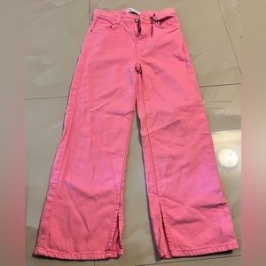 Pink pants with slit in the end
